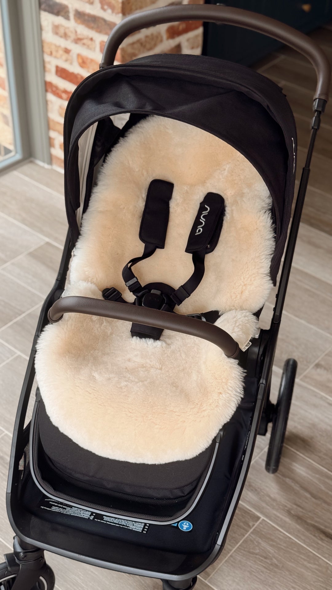 Nuna triv with sheepskin pram liner