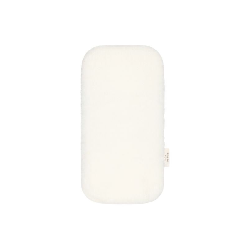 Baa Baby bassinet liner in a creamy milk colour