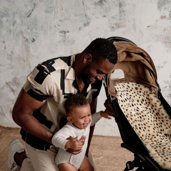 Dad with BabyZen YoYo Pram with Baby Comfortable in Lambskin Leopard Print Pram Liner