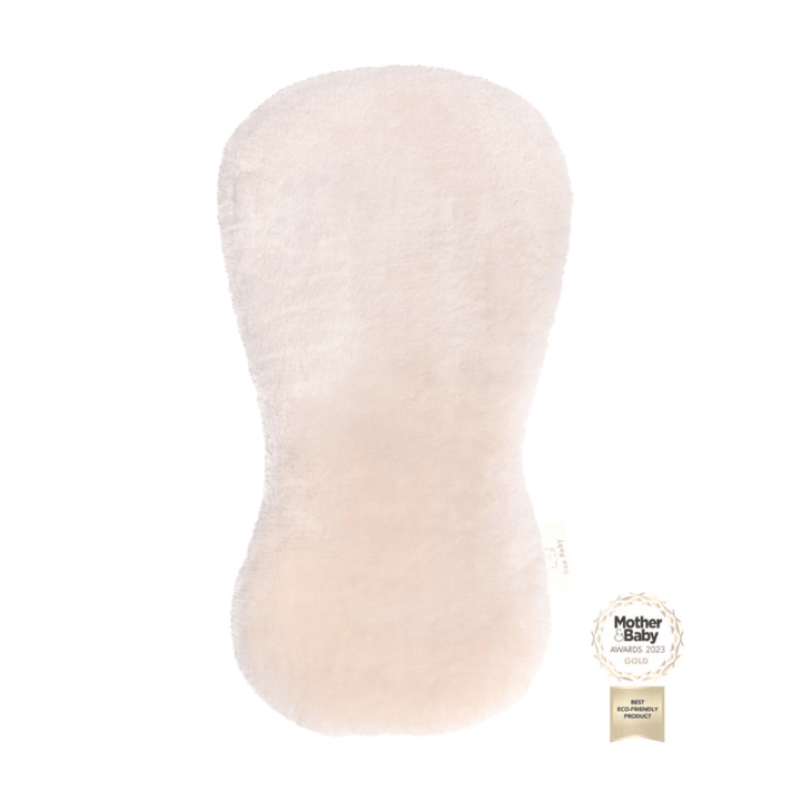 Milk sheepskin buggy liner in neutral milk shade