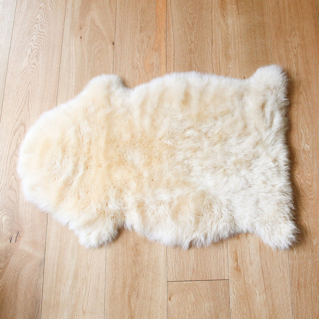 Bowron Sheepskin Shown Used as a Rug for Neutral, Natural, Nursery Decor