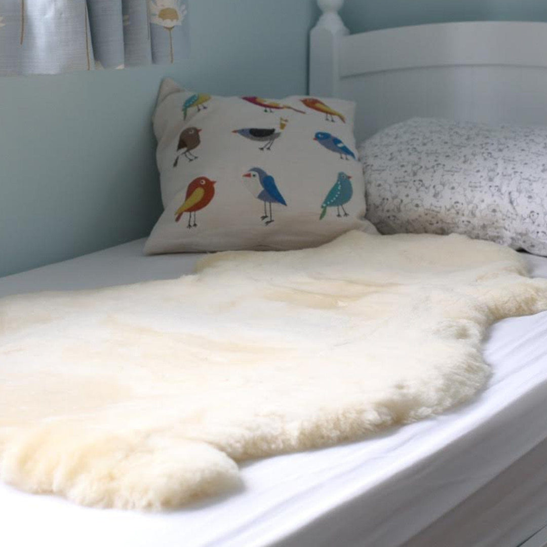 Bowron Large Sheepskin shown in Bed for Sleep Support and Temperature Regulation