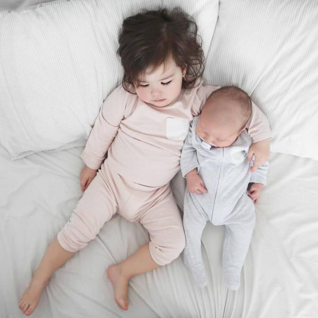 babies in MORI sustainable sleepwear for baby
