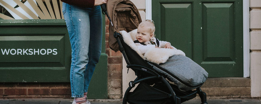 How Do I Fit A Sheepskin Footmuff To A Pram With A Solid Back?