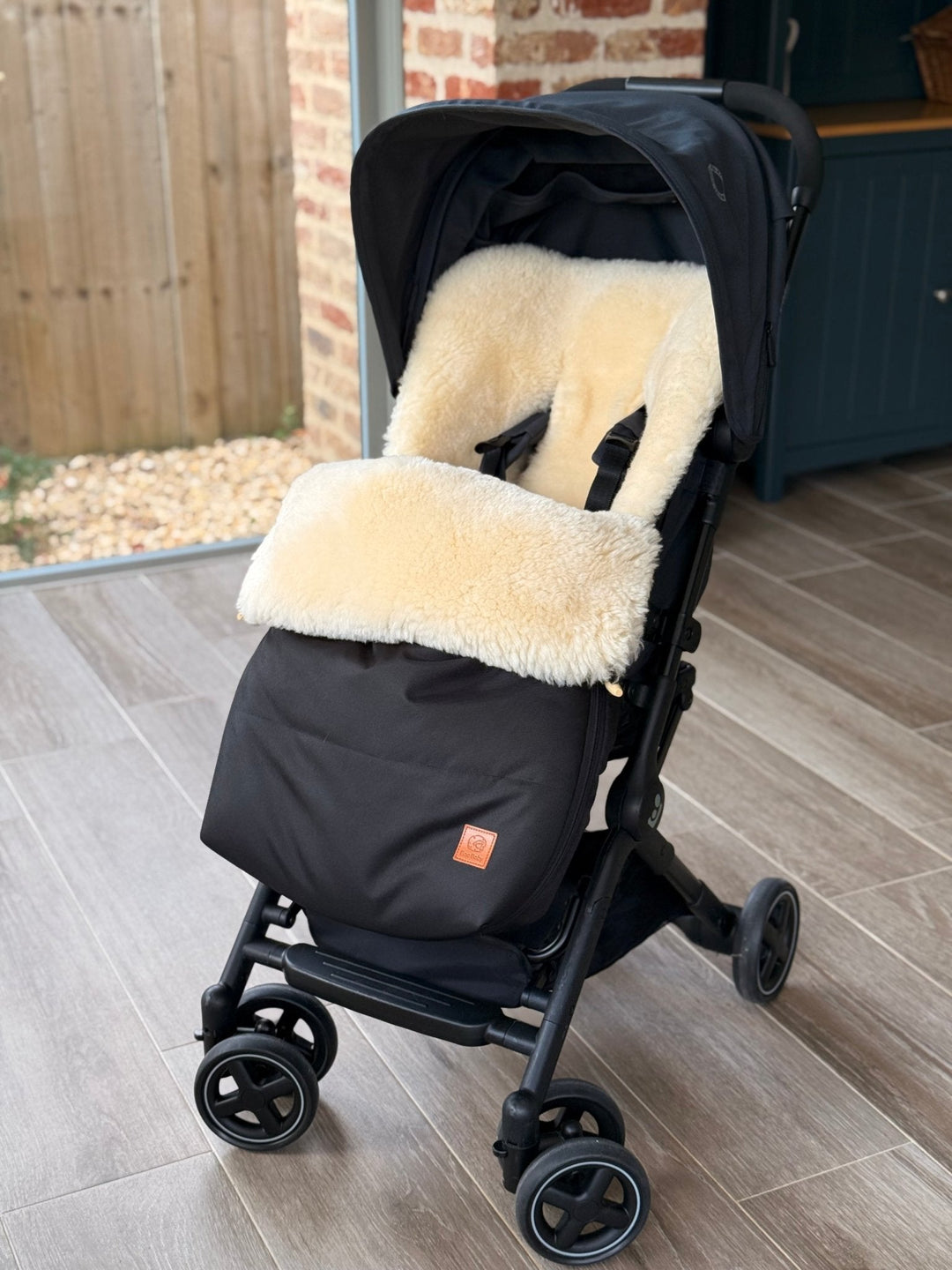 Sheepskin pram footmuff for the maxi cosi