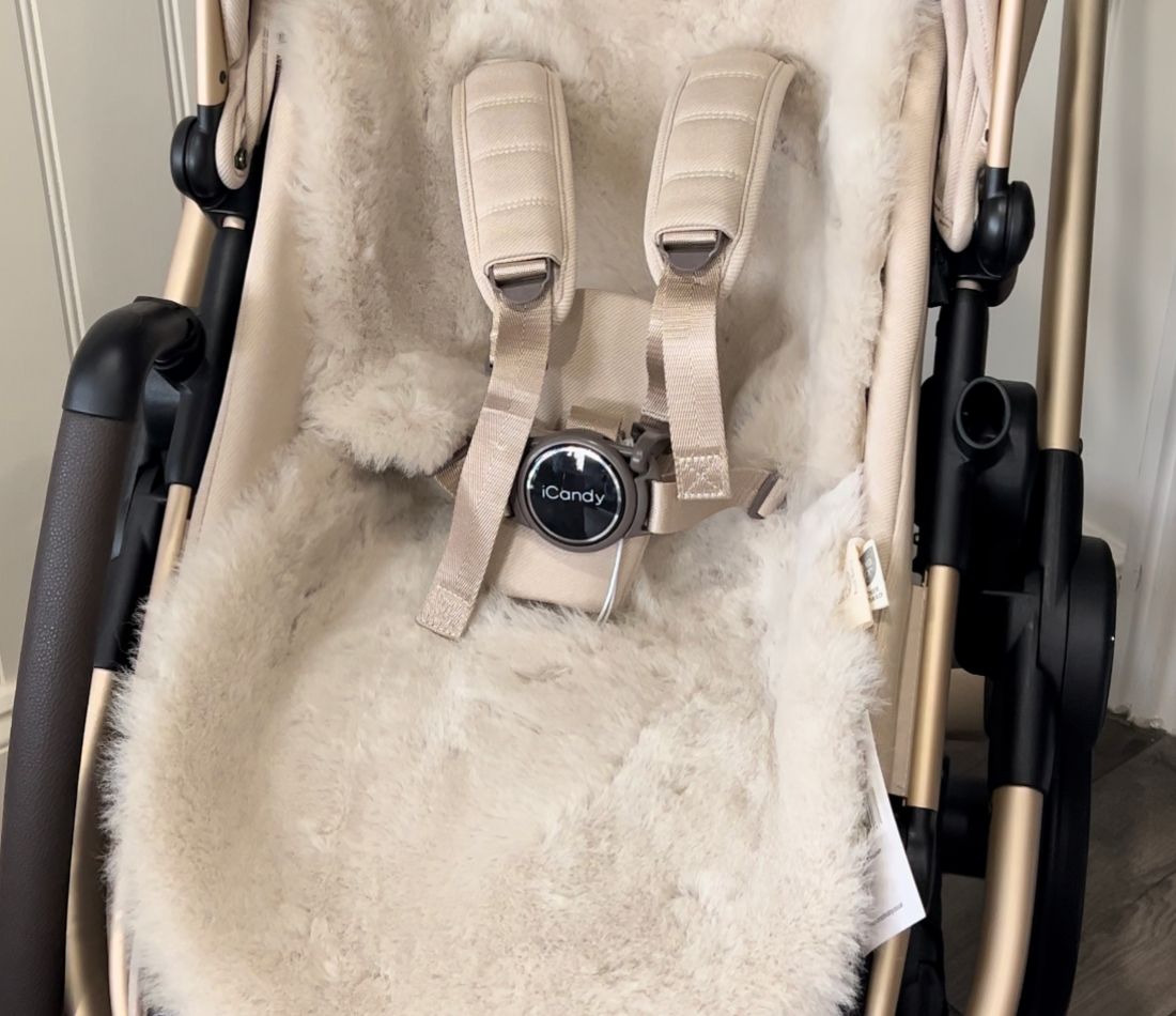  iCandy pram lined with Baa Baby sheepskin pram liner snuggler in a neutral latte shade fitting perfectly