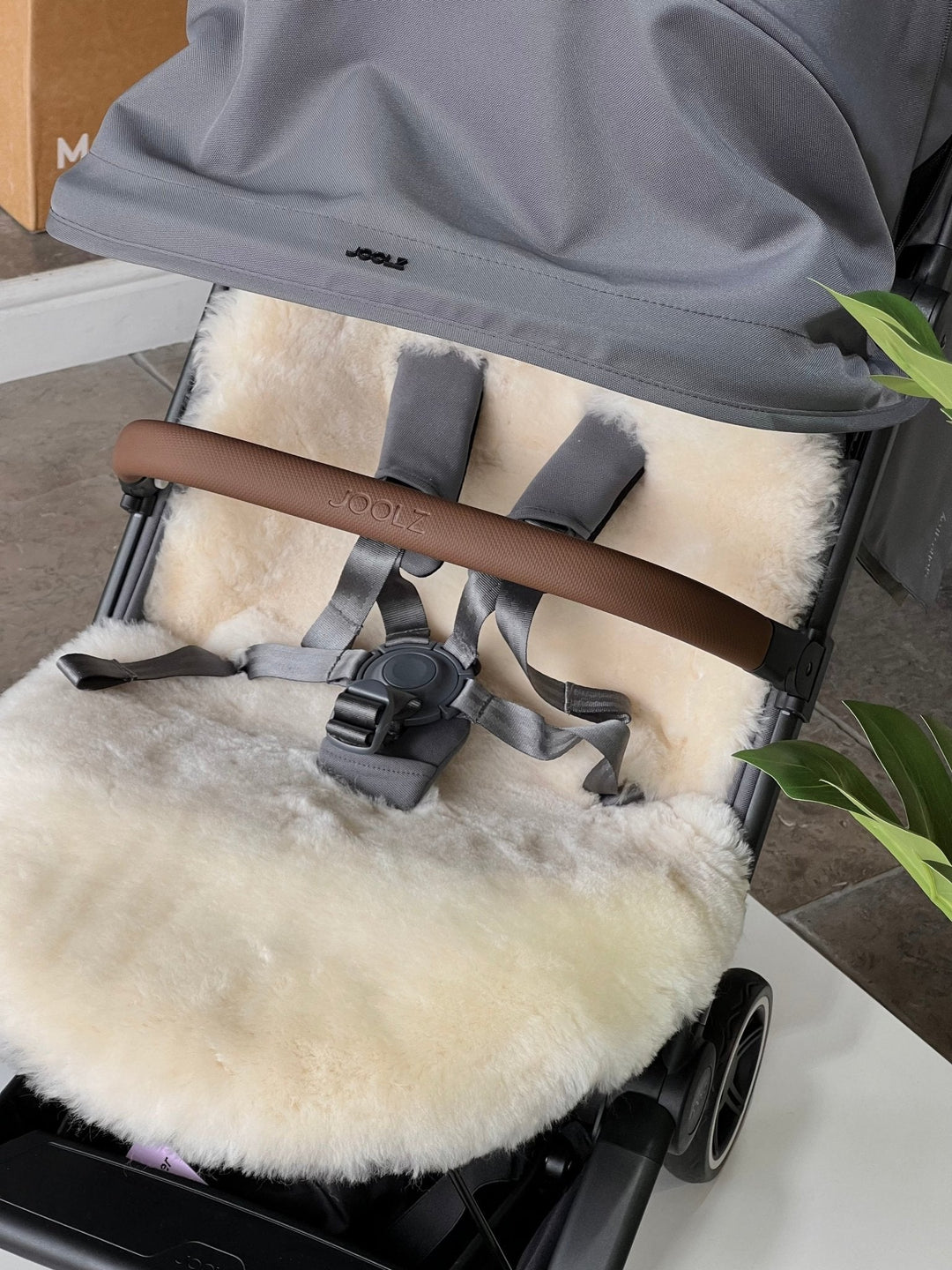 Sheepskin Pram Liner Fitting a Joolz Aer and Joolz Aer Plus travel pram perfectly