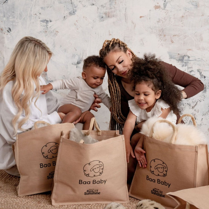 baby safe sheepskin rug and pram liner in a cotton and jute premium shopper bag