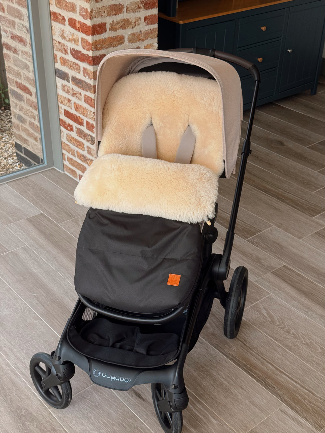 bugaboo fox 5 pram footmuff shown fitted perfectly with sheepskin