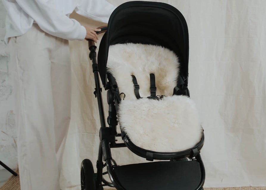Sheepskin buggy liner for strollers with fixed harness such as uppababy v2
