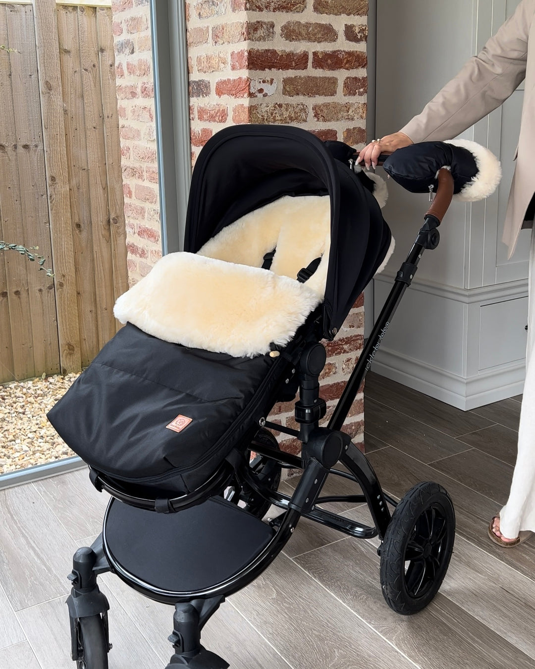 Ickle bubba with sheepskin footmuff