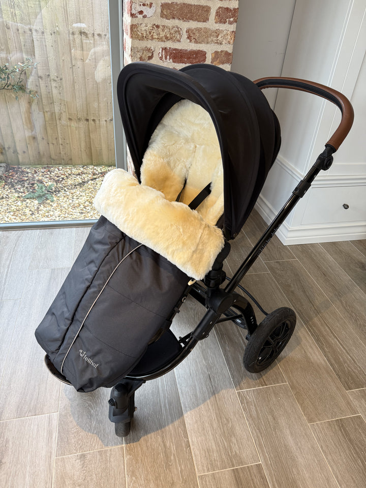 Fellhof Premium sheepskin pram footmuff in an ickle bubba pram 