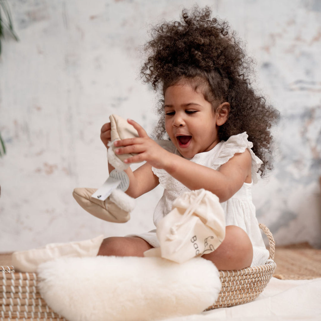 Neutral coloured lambskin booties for babies and toddlers hand crafted in New Zealand