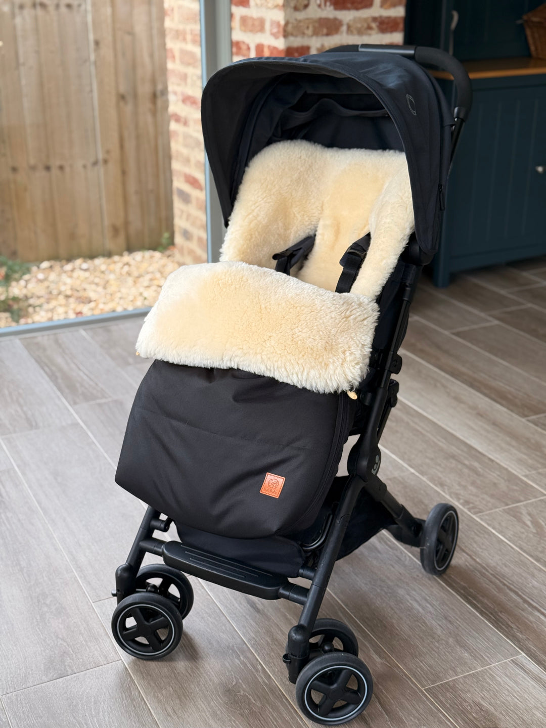 Original sheepskin pram footmuff in the bugaboo dragonfly stroller