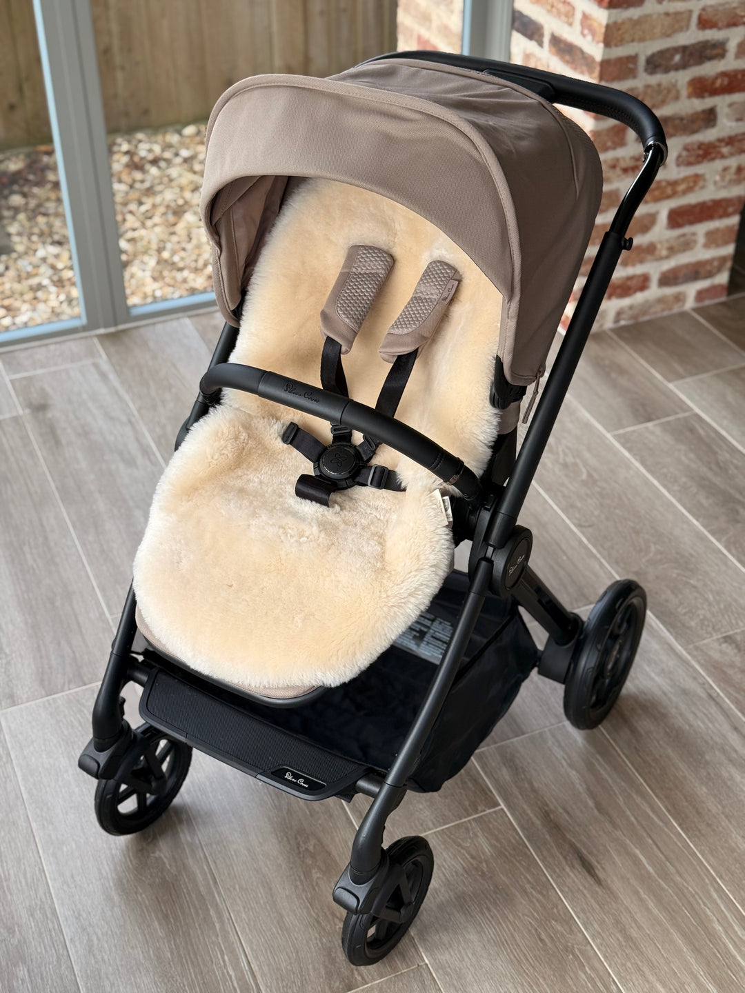 sheepskin pram liner in the silver cross reef 2 mocha