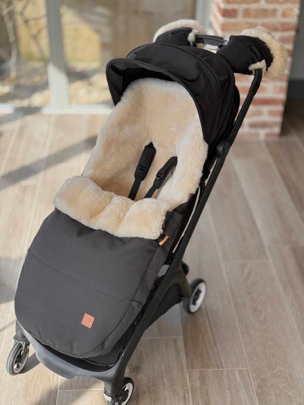 Sheepskin Footmuff in the Bugaboo Butterfly pram 