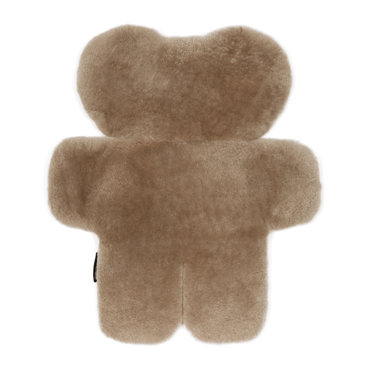 Baby Laying on Australian Sustainable Sheepskin FLATOUT Bear Rug in Brown Latte for tummy time or sleep
