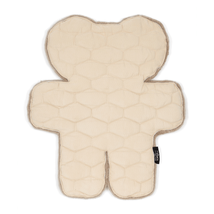 Baby Laying on Australian Sustainable Sheepskin FLATOUT Bear Rug in Brown Latte for tummy time or sleep
