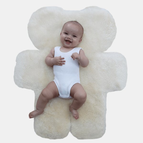 Baby on Australian Sustainable Lambskin Rug for Tummy Time and Sleep