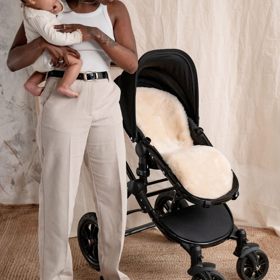 Honey Shorn Hair Lambskin Buggy Liner Shown in Mountain Buggy Pram