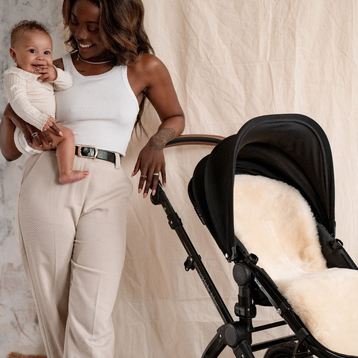 Honey Shorn Hair Lambskin Buggy Liner Shown in Mountain Buggy Pram