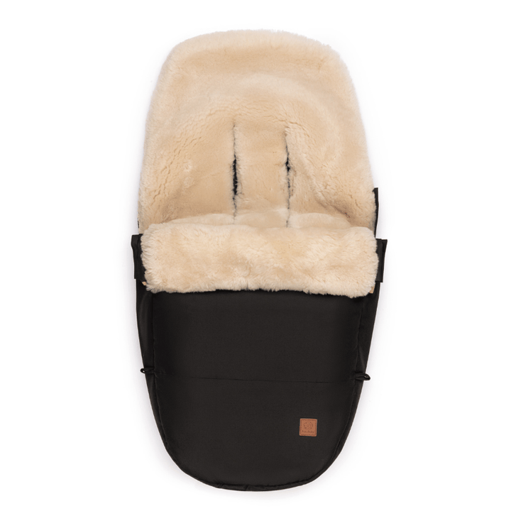 neutral milk sheepskin footmuff with black outer to fit bugaboo