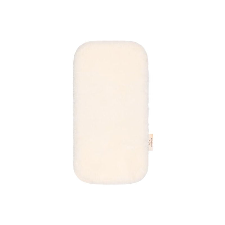 Baa Baby bassinet liner in a creamy milk colour
