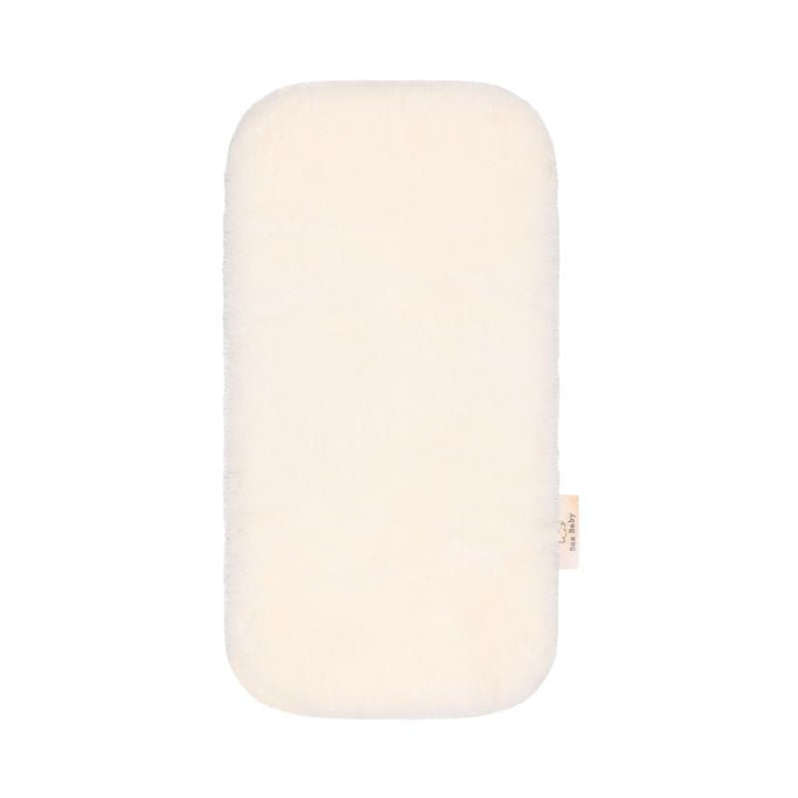Baa Baby bassinet liner in a creamy milk colour
