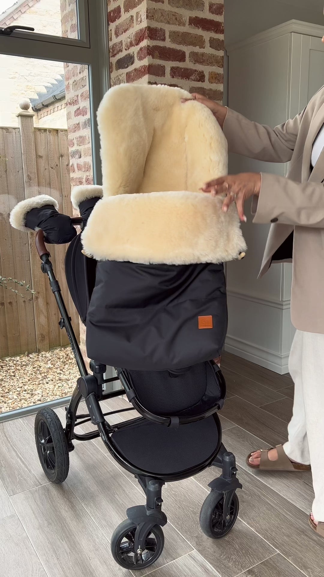 Baa Baby Original Sheepskin Footmuff | Black with Milk Lambskin