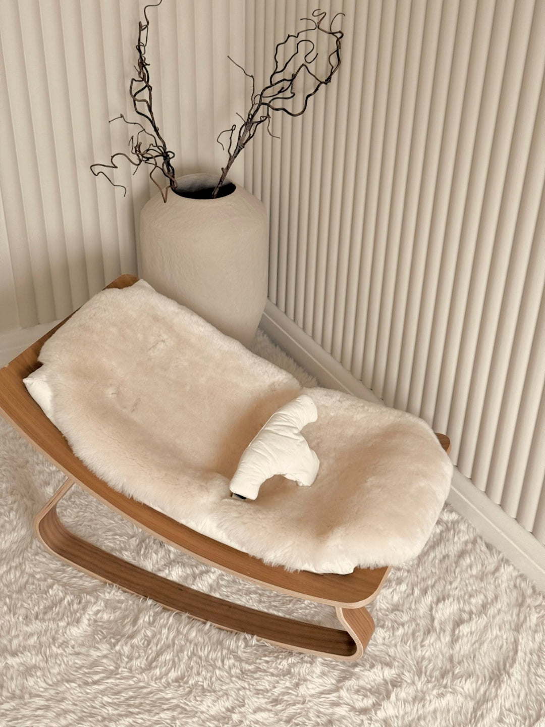 milk neutral pram liner in a charlie crane rocker
