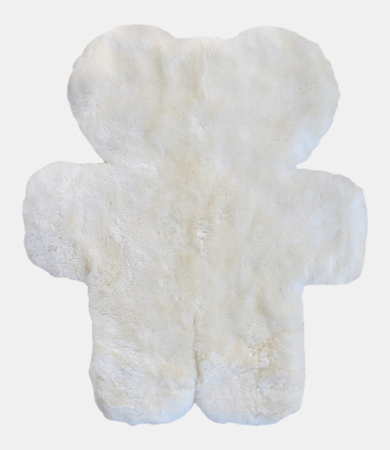 Natural Nursery Decor for Babies with Lambskin Rug Baby Safe