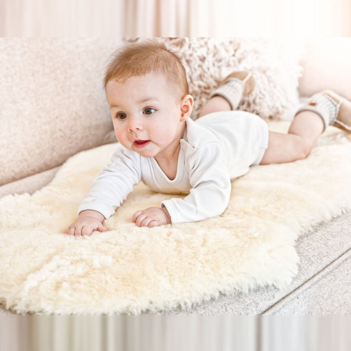 Baby Relaxing on Honey Sheepskin Shorn Rug for Even Weight Distribution