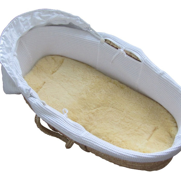 Heitmann Felle Honey Lambskin Liner Shown in Moses Basket with Dense Pile for Even Weight Distribution